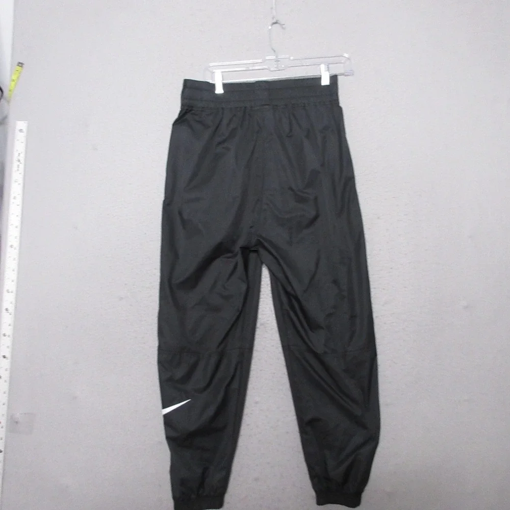 Nike Sportwear Joggers Pants Women Medium Black Woven Swoosh Sporty Windbreaker